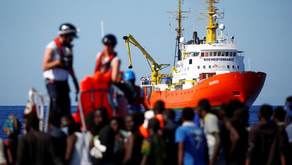 The MV Aquarius rescue ship is seen as migrants on are rescued by the SOS Mediterranee organisation during a search and rescue (SAR) operation in the Mediterranean Sea, off the Libyan Coast, September 14, 2017 The MV Aquarius rescue ship is seen as migrants on are rescued by the SOS Mediterranee organisation during a search and rescue (SAR) operation in the Mediterranean Sea, off the Libyan Coast, September 14, 2017 - Sputnik International