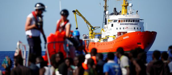 The MV Aquarius rescue ship is seen as migrants on are rescued by the SOS Mediterranee organisation during a search and rescue (SAR) operation in the Mediterranean Sea, off the Libyan Coast, September 14, 2017 The MV Aquarius rescue ship is seen as migrants on are rescued by the SOS Mediterranee organisation during a search and rescue (SAR) operation in the Mediterranean Sea, off the Libyan Coast, September 14, 2017 - Sputnik International