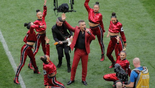 Soccer Football - World Cup - Opening Ceremony - Luzhniki Stadium, Moscow, Russia - June 14, 2018 Robbie Williams performs during the opening ceremony - Sputnik International