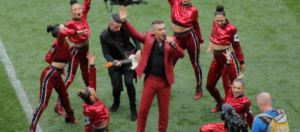Soccer Football - World Cup - Opening Ceremony - Luzhniki Stadium, Moscow, Russia - June 14, 2018 Robbie Williams performs during the opening ceremony - Sputnik International