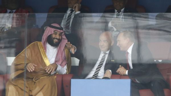 Saudi Arabia Crown Prince Mohammed bin Salman, left, FIFA President Gianni Infantino, center, and Russian President Vladimir Putin watch the match between Russia and Saudi Arabia which opens the 2018 soccer World Cup at the Luzhniki stadium in Moscow, Russia, Thursday, June 14, 2018. Saudi Arabia Crown Prince Mohammed bin Salman, left, FIFA President Gianni Infantino, center, and Russian President Vladimir Putin watch the match between Russia and Saudi Arabia which opens the 2018 soccer World Cup at the Luzhniki stadium in Moscow, Russia, Thursday, June 14, 2018. - Sputnik International