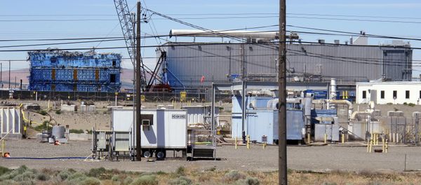 This May 13, 2017, photo shows a portion of the Plutonium Finishing Plant on the Hanford Nuclear Reservation near Richland, Wash. Officials say dozens of workers demolishing the 1940s-era plutonium processing plant there have ingested or inhaled radioactive particles in the past year, prompting a halt to the demolition of the plant until a safe plan can be developed. This May 13, 2017, photo shows a portion of the Plutonium Finishing Plant on the Hanford Nuclear Reservation near Richland, Wash. Officials say dozens of workers demolishing the 1940s-era plutonium processing plant there have ingested or inhaled radioactive particles in the past year, prompting a halt to the demolition of the plant until a safe plan can be developed. - Sputnik International