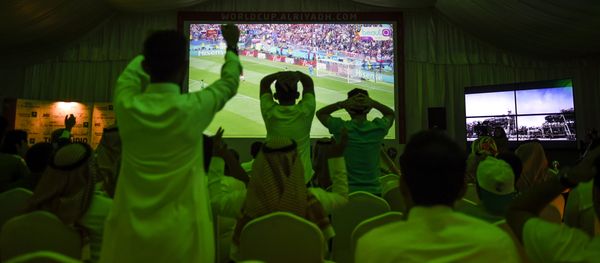 Saudi football fans cheer for their national team during their Russia 2018 World Cup Group A football match against Russia at a fan tent in the capital Riyadh on June 14, 2018 - Sputnik International
