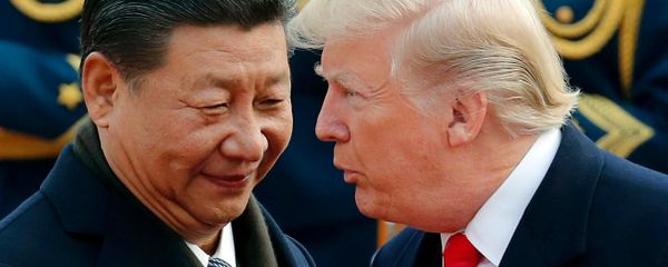 In this Nov. 9, 2017, file photo, U.S. President Donald Trump, right, chats with Chinese President Xi Jinping during a welcome ceremony at the Great Hall of the People in Beijing - Sputnik International