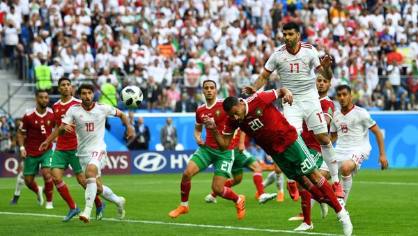 Soccer Football - World Cup - Group B - Morocco vs Iran - Saint Petersburg Stadium, Saint Petersburg, Russia - June 15, 2018 Morocco's Aziz Bouhaddouz scores an own goal for Iran's first goal Soccer Football - World Cup - Group B - Morocco vs Iran - Saint Petersburg Stadium, Saint Petersburg, Russia - June 15, 2018 Morocco's Aziz Bouhaddouz scores an own goal for Iran's first goal - Sputnik International