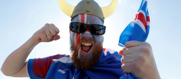 Soccer Football - FIFA World Cup - Group D - Argentina v Iceland - Moscow, Russia - June 16, 2018. A supporter of Iceland cheers in Zaryadye Park - Sputnik International