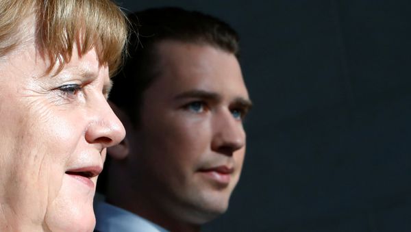 German Chancellor Angela Merkel and Austrian Chancellor Sebastian Kurz arrive at a news conference in the chancellery in Berlin - Sputnik International