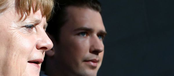 German Chancellor Angela Merkel and Austrian Chancellor Sebastian Kurz arrive at a news conference in the chancellery in Berlin German Chancellor Angela Merkel and Austrian Chancellor Sebastian Kurz arrive at a news conference in the chancellery in Berlin - Sputnik International
