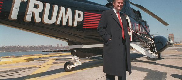 Donald Trump stands next to one of his three Sikorsky helicopters at New York Port Authority's West 30 Street Heliport in this March, 1988 photo - Sputnik International