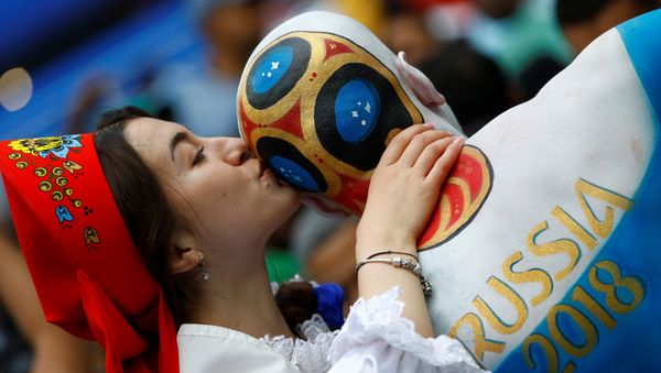 Soccer Football - World Cup - Group A - Russia vs Saudi Arabia - Luzhniki Stadium, Moscow, Russia - June 14, 2018 Russia fan with body paint before the match - Sputnik International