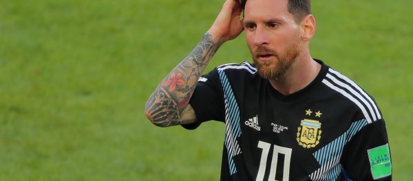Dejected Argentina's Lionel Messi reacts leaving a pitch after the 1-1 draw at World Cup Group D soccer match between Argentina and Iceland at the Spartak stadium in Moscow, Russia, June 16, 2018 - Sputnik International