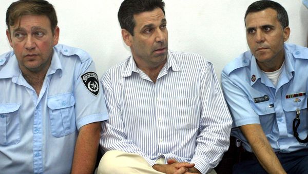 Former Israeli energy minister Gonen Segev (C) appears at the Tel Aviv district tribunal 22 April 2004 Former Israeli energy minister Gonen Segev (C) appears at the Tel Aviv district tribunal 22 April 2004 - Sputnik International