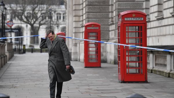 British politician Dominic Grieve lifts the police cordon as he walks along Whitehall in Westminster, central London (File) British politician Dominic Grieve lifts the police cordon as he walks along Whitehall in Westminster, central London (File) - Sputnik International