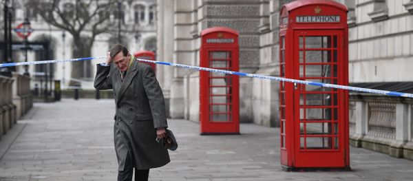 British politician Dominic Grieve lifts the police cordon as he walks along Whitehall in Westminster, central London (File) British politician Dominic Grieve lifts the police cordon as he walks along Whitehall in Westminster, central London (File) - Sputnik International