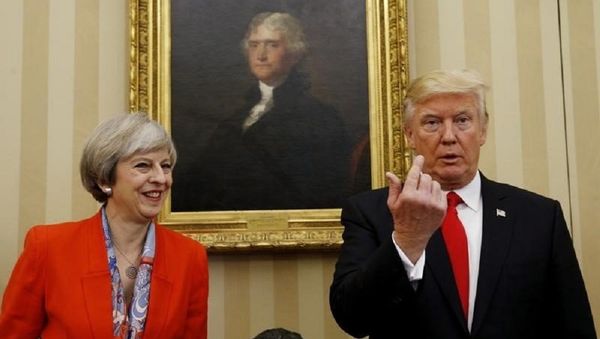 US President Donald Trump gestures as he meets with British Prime Minister Theresa May in the Oval Office of the White House in Washington January 27, 2017. US President Donald Trump gestures as he meets with British Prime Minister Theresa May in the Oval Office of the White House in Washington January 27, 2017. - Sputnik International