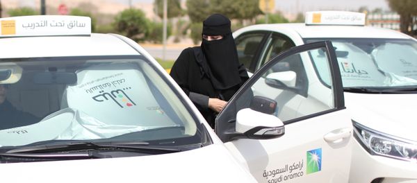 Trainee Amira Abdelgader gets into a car for her driving lesson at Saudi Aramco Driving Center in Dhahran, Saudi Arabia, June 6, 2018 Trainee Amira Abdelgader gets into a car for her driving lesson at Saudi Aramco Driving Center in Dhahran, Saudi Arabia, June 6, 2018 - Sputnik International