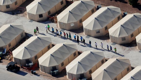 Immigrant children now housed in a tent encampment under the new zero tolerance policy by the Trump administration are shown walking in single file at the facility near the Mexican border in Tornillo, Texas, U.S. June 19, 2018 Immigrant children now housed in a tent encampment under the new zero tolerance policy by the Trump administration are shown walking in single file at the facility near the Mexican border in Tornillo, Texas, U.S. June 19, 2018 - Sputnik International