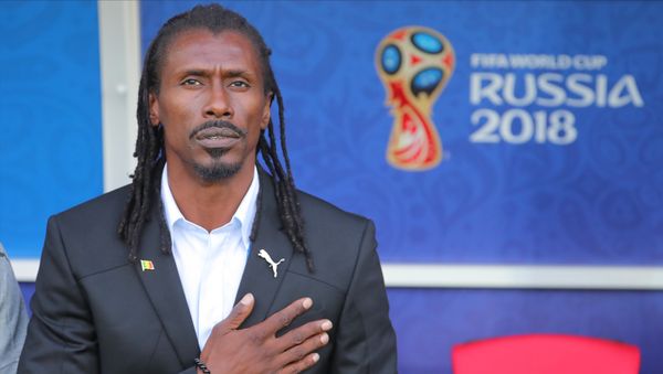Senegal's head coach Aliou Cisse listens to the national anthem before the World Cup Group H soccer match between Poland and Senegal at the Spartak stadium in Moscow, Russia, June 19, 2018 Senegal's head coach Aliou Cisse listens to the national anthem before the World Cup Group H soccer match between Poland and Senegal at the Spartak stadium in Moscow, Russia, June 19, 2018 - Sputnik International