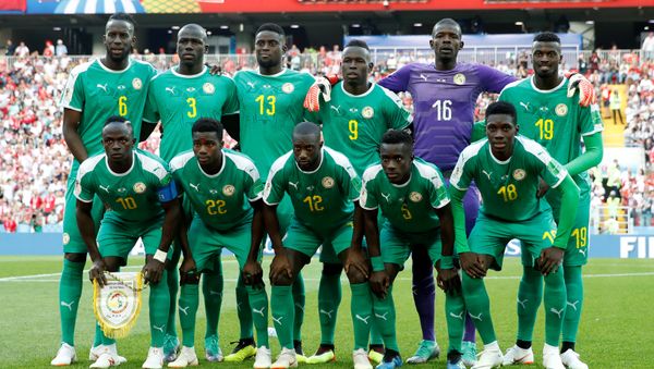 Soccer Football - World Cup - Group H - Poland vs Senegal - Spartak Stadium, Moscow, Russia - June 19, 2018 Senegal players pose for a team group photo before the match - Sputnik International