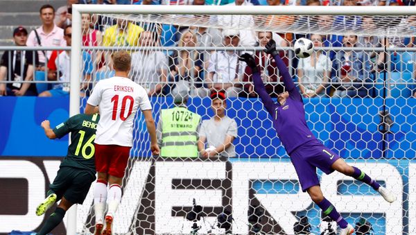 Soccer Football - World Cup - Group C - Denmark vs Australia - Samara Arena, Samara, Russia - June 21, 2018 Denmark's Christian Eriksen scores their first goal past Australia's Mathew Ryan Soccer Football - World Cup - Group C - Denmark vs Australia - Samara Arena, Samara, Russia - June 21, 2018 Denmark's Christian Eriksen scores their first goal past Australia's Mathew Ryan - Sputnik International