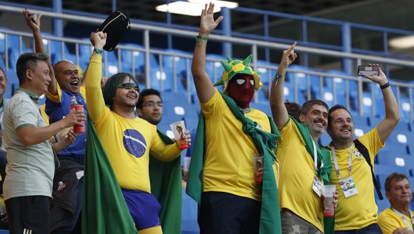 Brazilians fans gesture as they wait for the start of the group E match between Brazil and Switzerland at the 2018 soccer World Cup in the Rostov Arena in Rostov-on-Don, Russia, Sunday, June 17, 2018. (AP Photo/Darko Vojinovic) Brazilians fans gesture as they wait for the start of the group E match between Brazil and Switzerland at the 2018 soccer World Cup in the Rostov Arena in Rostov-on-Don, Russia, Sunday, June 17, 2018. (AP Photo/Darko Vojinovic) - Sputnik International