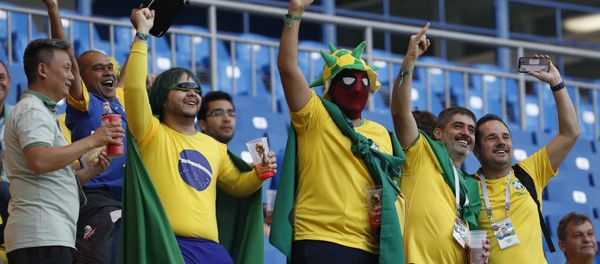 Brazilians fans gesture as they wait for the start of the group E match between Brazil and Switzerland at the 2018 soccer World Cup in the Rostov Arena in Rostov-on-Don, Russia, Sunday, June 17, 2018. (AP Photo/Darko Vojinovic) Brazilians fans gesture as they wait for the start of the group E match between Brazil and Switzerland at the 2018 soccer World Cup in the Rostov Arena in Rostov-on-Don, Russia, Sunday, June 17, 2018. (AP Photo/Darko Vojinovic) - Sputnik International