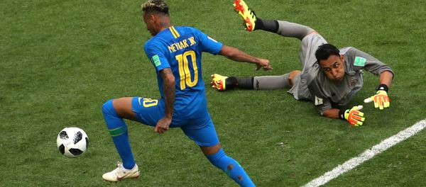 Soccer Football - World Cup - Group E - Brazil vs Costa Rica - Saint Petersburg Stadium, Saint Petersburg, Russia - June 22, 2018 Brazil's Neymar scores their second goal as Costa Rica's Keylor Navas looks on - Sputnik International