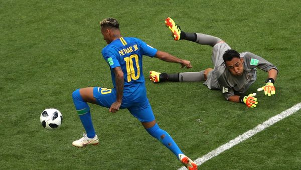 Soccer Football - World Cup - Group E - Brazil vs Costa Rica - Saint Petersburg Stadium, Saint Petersburg, Russia - June 22, 2018 Brazil's Neymar scores their second goal as Costa Rica's Keylor Navas looks on - Sputnik International