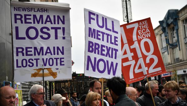 (File) Pro-Brexit demonstrators gather outside the venue of a launch event for the People’s Vote campaign in London on April 15, 2018 that is calling for a referendum on the final Brexit deal - Sputnik International