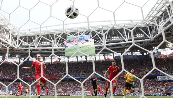 Soccer Football - World Cup - Group G - Belgium vs Tunisia - Spartak Stadium, Moscow, Russia - June 23, 2018 Belgium's Eden Hazard celebrates scoring their fourth goal as Tunisia's Hamdi Nagguez reacts - Sputnik International
