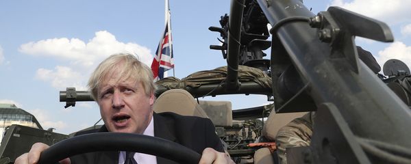 Britain's Foreign Secretary Boris Johnson talks to a British armed forces serviceman based in Orzysz, in northeastern Poland, during a ceremony at the Tomb of the Unknown Soldier and following talks on security with his Polish counterpart Jacek Czaputowicz in Warsaw, Poland, Thursday, June 21, 2018 Britain's Foreign Secretary Boris Johnson talks to a British armed forces serviceman based in Orzysz, in northeastern Poland, during a ceremony at the Tomb of the Unknown Soldier and following talks on security with his Polish counterpart Jacek Czaputowicz in Warsaw, Poland, Thursday, June 21, 2018 - Sputnik International