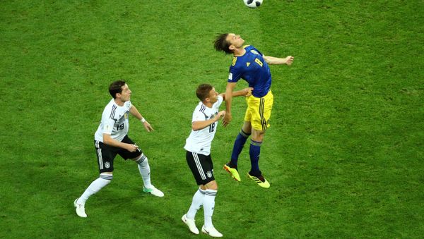 World Cup - Group F - Germany vs Sweden - Fisht Stadium, Sochi, Russia - June 23, 2018 Sweden's Albin Ekdal in action with Germany's Sebastian Rudy and Joshua Kimmich - Sputnik International