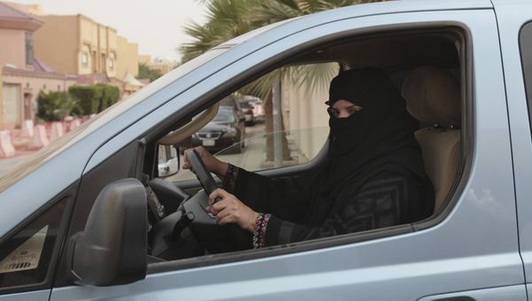 FILE- In this Saturday, March 29, 2014 file photo, a woman drives a car in Riyadh, Saudi Arabia, as part of a campaign to defy Saudi Arabia's ban on women driving. - Sputnik International