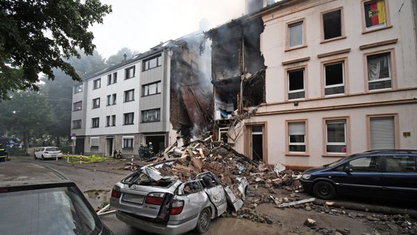 A car is covered by debris of a house that has exploded in the night in Wuppertal, western Germany, on June 24, 2018 - Sputnik International
