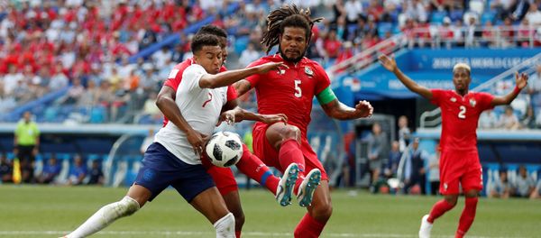 Soccer Football - World Cup - Group G - England vs Panama - Nizhny Novgorod Stadium, Nizhny Novgorod, Russia - June 24, 2018 England's Jesse Lingard in action with Panama's Roman Torres and Fidel Escobar Soccer Football - World Cup - Group G - England vs Panama - Nizhny Novgorod Stadium, Nizhny Novgorod, Russia - June 24, 2018 England's Jesse Lingard in action with Panama's Roman Torres and Fidel Escobar - Sputnik International