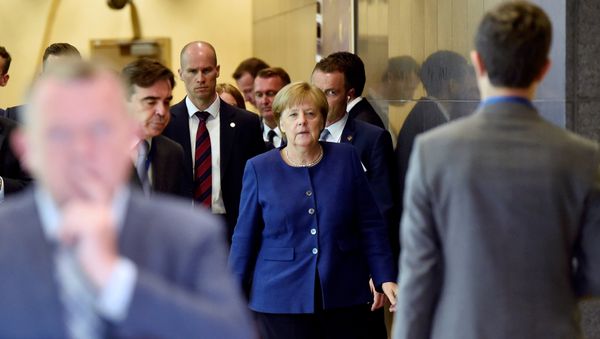 German Chancellor Angela Merkel arrives to take part in an emergency European Union leaders summit on immigration, in Brussels, Belgium June 24, 2018 German Chancellor Angela Merkel arrives to take part in an emergency European Union leaders summit on immigration, in Brussels, Belgium June 24, 2018 - Sputnik International