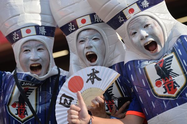 Japan's fans cheer waiting for a start of the World Cup Group H soccer match between Japan and Senegal at the Ekaterinburg stadium, in Yekaterinburg, Russia, June 24, 2018 Japan's fans cheer waiting for a start of the World Cup Group H soccer match between Japan and Senegal at the Ekaterinburg stadium, in Yekaterinburg, Russia, June 24, 2018 - Sputnik International