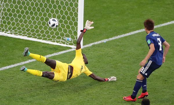 Soccer Football - World Cup - Group H - Japan vs Senegal - Ekaterinburg Arena, Yekaterinburg, Russia - June 24, 2018 Senegal's Khadim N'Diaye is beaten as Japan's Takashi Inui (not pictured) scores their first goal Soccer Football - World Cup - Group H - Japan vs Senegal - Ekaterinburg Arena, Yekaterinburg, Russia - June 24, 2018 Senegal's Khadim N'Diaye is beaten as Japan's Takashi Inui (not pictured) scores their first goal - Sputnik International