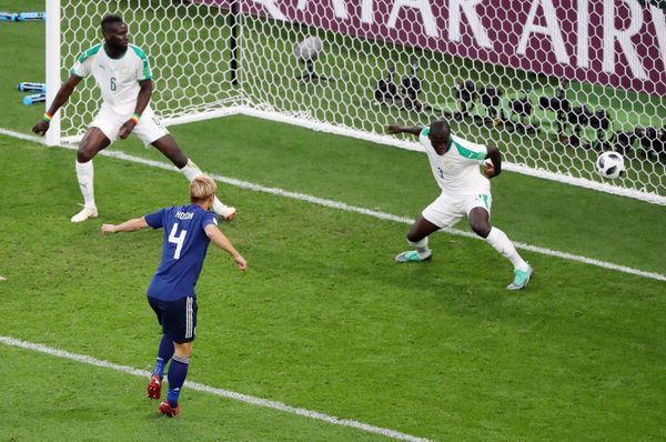 Soccer Football - World Cup - Group H - Japan vs Senegal - Ekaterinburg Arena, Yekaterinburg, Russia - June 24, 2018 Japan's Keisuke Honda scores their second goal Soccer Football - World Cup - Group H - Japan vs Senegal - Ekaterinburg Arena, Yekaterinburg, Russia - June 24, 2018 Japan's Keisuke Honda scores their second goal - Sputnik International