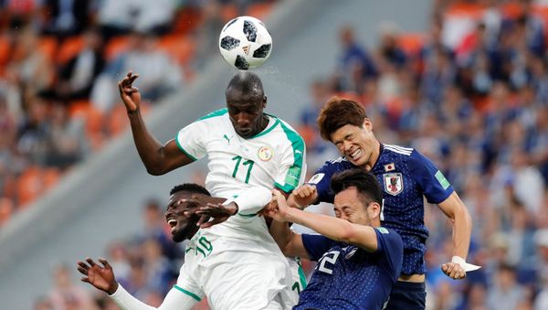 Soccer Football - World Cup - Group H - Japan vs Senegal - Ekaterinburg Arena, Yekaterinburg, Russia - June 24, 2018 Japan's Hiroki Sakai and Maya Yoshida in action with Senegal's Cheikh N'Doye and M'Baye Niang - Sputnik International