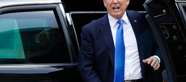 US President Donald Trump gets out of the car - Sputnik International