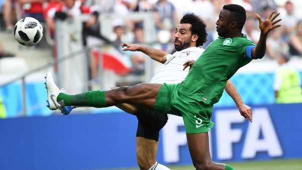 Soccer Football - World Cup - Group A - Saudi Arabia vs Egypt - Volgograd Arena, Volgograd, Russia - June 25, 2018 Egypt's Mohamed Salah in action with Saudi Arabia's Osama Hawsawi - Sputnik International