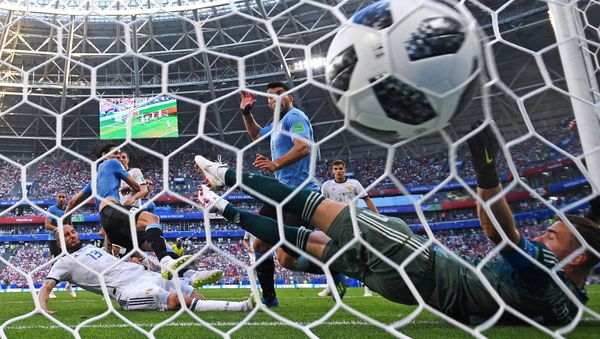 Soccer Football - World Cup - Group A - Uruguay vs Russia - Samara Arena, Samara, Russia - June 25, 2018 Uruguay's Edinson Cavani scores their third goal - Sputnik International