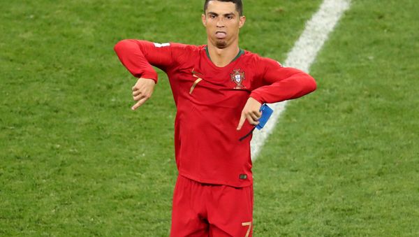 Soccer Football - World Cup - Group B - Iran vs Portugal - Mordovia Arena, Saransk, Russia - June 25, 2018 Portugal's Cristiano Ronaldo reacts after the match referencing Soccer Football - World Cup - Group B - Iran vs Portugal - Mordovia Arena, Saransk, Russia - June 25, 2018 Portugal's Cristiano Ronaldo reacts after the match referencing - Sputnik International