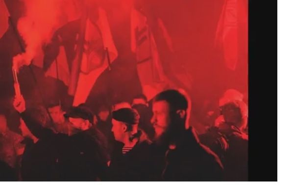 'March of Heroes' with veterans of the Azov Regiment, 2015. Sanovsky pictured center. To his left is Sergei Bondarenko, another Azov veteran then serving as deputy chief of the Main Directorate of the National Police for the Kiev Region. - Sputnik International