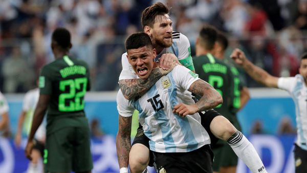 Soccer Football - World Cup - Group D - Nigeria vs Argentina - Saint Petersburg Stadium, Saint Petersburg, Russia - June 26, 2018 Argentina's Marcos Rojo celebrates scoring their second goal with Lionel Messi - Sputnik International