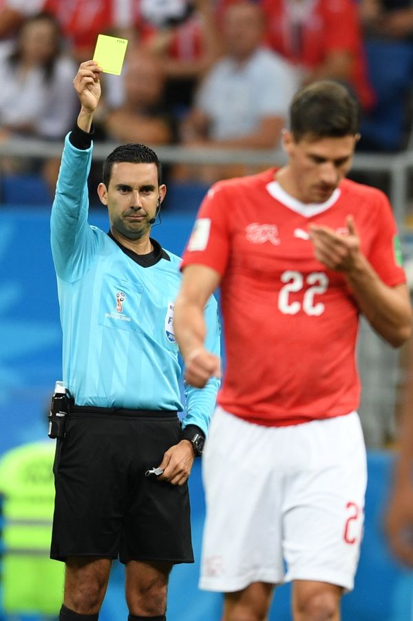 Referee Cesar Ramos shows the yellow card to Switzerland's Fabian Schaer during the World Cup Group E soccer match between Brazil and Switzerland in Rostov-on-Don, Russia, June 17, 2018. - Sputnik International