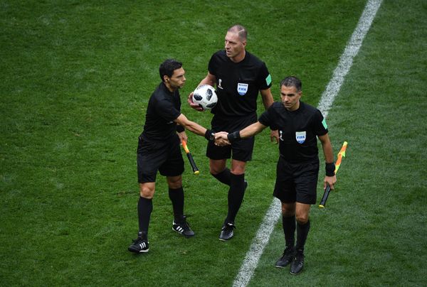 Referees shake hands during the World Cup Group A soccer match between Russia and Saudi Arabia at the Luzhniki stadium in Moscow, Russia, June 14, 2018. - Sputnik International
