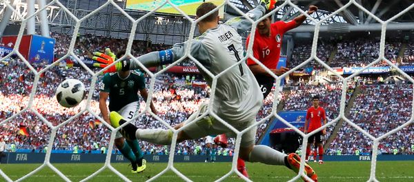 Soccer Football - World Cup - Group F - South Korea vs Germany - Kazan Arena, Kazan, Russia - June 27, 2018 South Korea's Kim Young-gwon scores their first goal past Germany's Manuel Neuer Soccer Football - World Cup - Group F - South Korea vs Germany - Kazan Arena, Kazan, Russia - June 27, 2018 South Korea's Kim Young-gwon scores their first goal past Germany's Manuel Neuer - Sputnik International