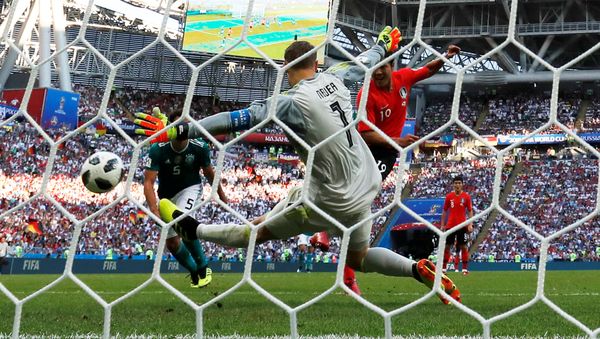 Soccer Football - World Cup - Group F - South Korea vs Germany - Kazan Arena, Kazan, Russia - June 27, 2018 South Korea's Kim Young-gwon scores their first goal past Germany's Manuel Neuer Soccer Football - World Cup - Group F - South Korea vs Germany - Kazan Arena, Kazan, Russia - June 27, 2018 South Korea's Kim Young-gwon scores their first goal past Germany's Manuel Neuer - Sputnik International